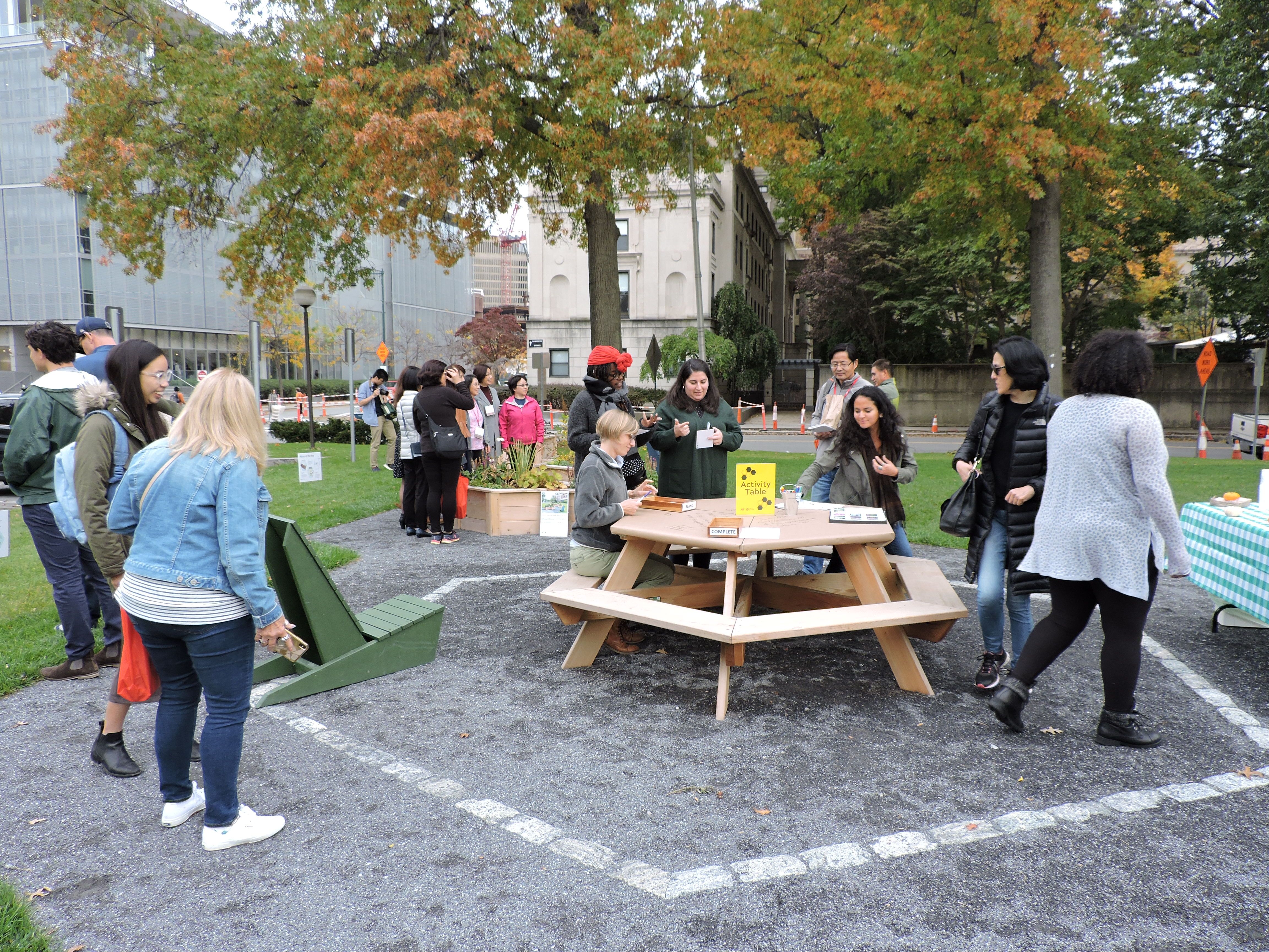 students around picnic table at mit