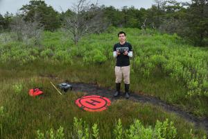 Graduate student Ernie I. H. Lee uses drone imaging and machine learning to help map salt marsh species, plant height, and shoots per bed area.